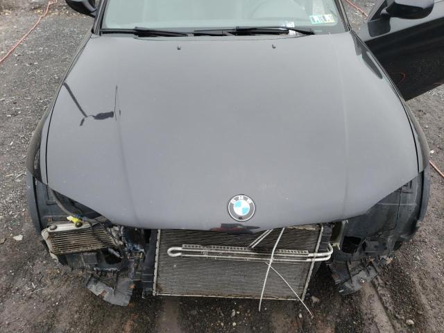 WBAUC7C54AVK96442 - 2010 BMW 135 I BLACK photo 11