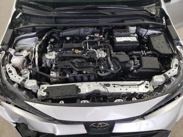 5YFB4MDE4PP047977 - 2023 TOYOTA COROLLA LE SILVER photo 11