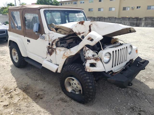 1J4FY49S4XP444654 - 1999 JEEP WRANGLER / SAHARA WHITE photo 4