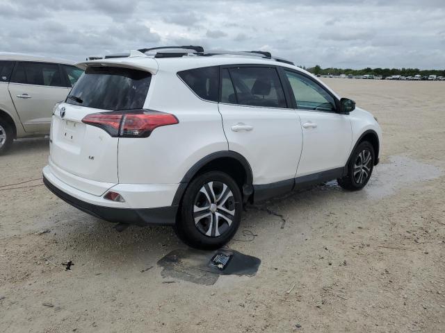 2T3ZFREV9JW488358 - 2018 TOYOTA RAV4 LE WHITE photo 3