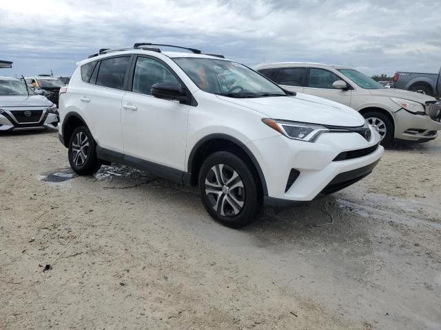 2T3ZFREV9JW488358 - 2018 TOYOTA RAV4 LE WHITE photo 4