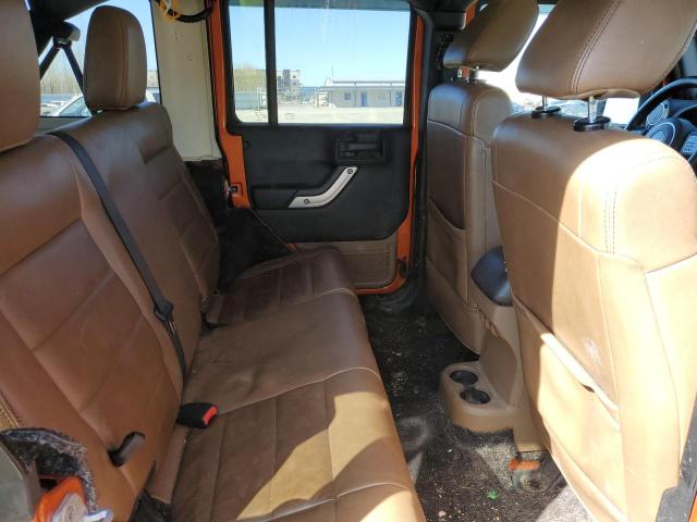1J4HA5H15BL555144 - 2011 JEEP WRANGLER U SAHARA ORANGE photo 11