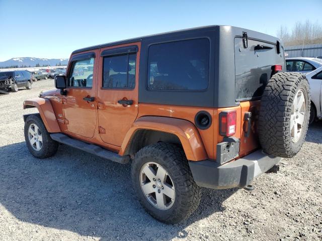 1J4HA5H15BL555144 - 2011 JEEP WRANGLER U SAHARA ORANGE photo 2