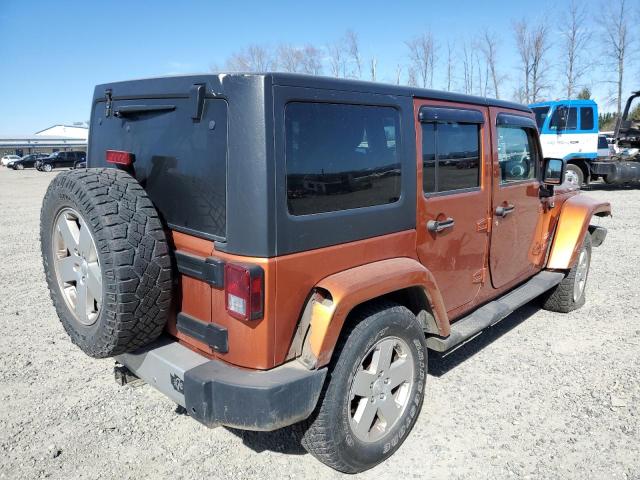 1J4HA5H15BL555144 - 2011 JEEP WRANGLER U SAHARA ORANGE photo 3