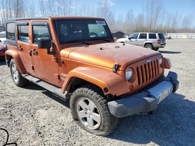 1J4HA5H15BL555144 - 2011 JEEP WRANGLER U SAHARA ORANGE photo 4