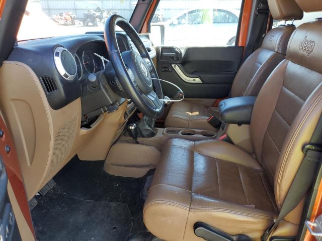 1J4HA5H15BL555144 - 2011 JEEP WRANGLER U SAHARA ORANGE photo 7