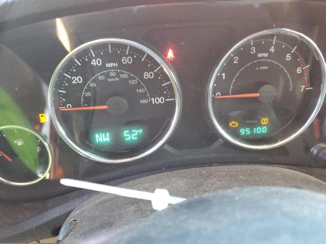 1J4HA5H15BL555144 - 2011 JEEP WRANGLER U SAHARA ORANGE photo 9