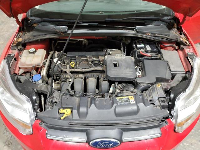 1FAHP3K25CL150340 - 2012 FORD FOCUS SE RED photo 11