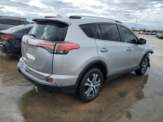 JTMZFREV9JJ212213 - 2018 TOYOTA RAV4 LE SILVER photo 3