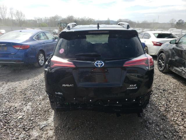 JTMRJREV7JD250634 - 2018 TOYOTA RAV4 HV LE BLACK photo 6