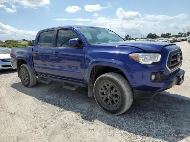 3TYCZ5AN6PT137238 - 2023 TOYOTA TACOMA DOUBLE CAB BLUE photo 4