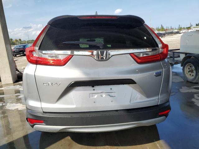 2HKRW5H39KH404311 - 2019 HONDA CR-V LX SILVER photo 6