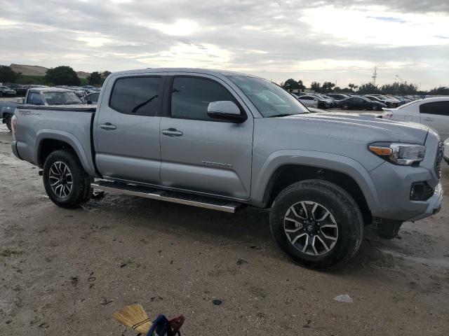 3TMAZ5CN8PM219651 - 2023 TOYOTA TACOMA DOUBLE CAB SILVER photo 4