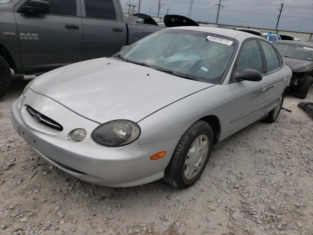 1FAFP52UXXG151292 - 1999 FORD TAURUS LX SILVER photo 1