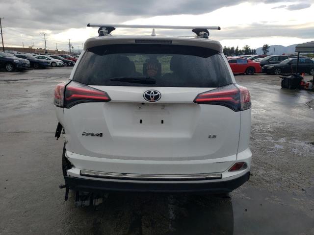 JTMZFREV1JJ205868 - 2018 TOYOTA RAV4 LE WHITE photo 6