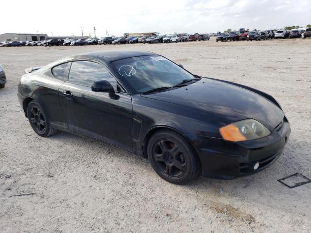 KMHHM65D54U126810 - 2004 HYUNDAI TIBURON BLACK photo 4