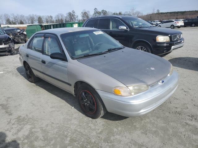 1Y1SK5284YZ421256 - 2000 CHEVROLET GEO PRIZM BASE WHITE photo 4