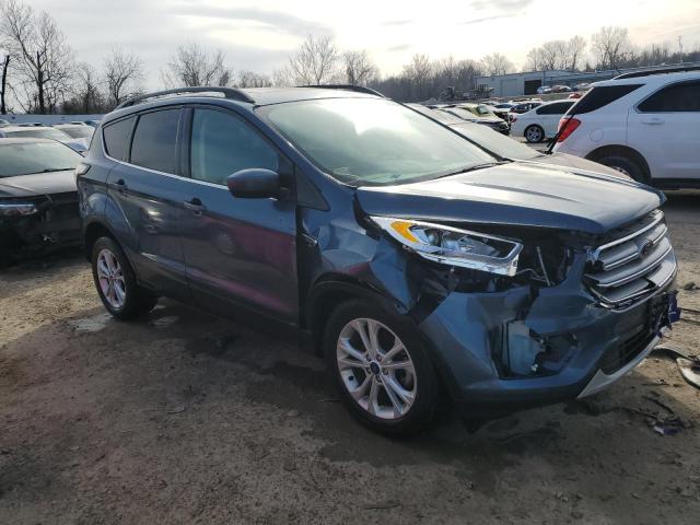 1FMCU0HD7JUC75489 - 2018 FORD ESCAPE SEL BLUE photo 4