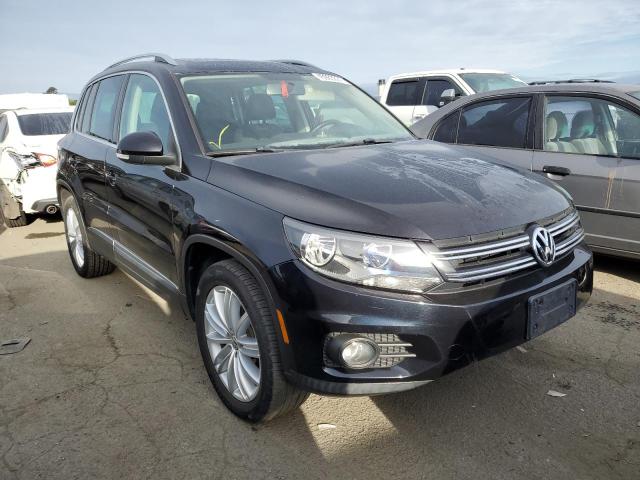 WVGAV7AXXDW550475 - 2013 VOLKSWAGEN TIGUAN S BLACK photo 4