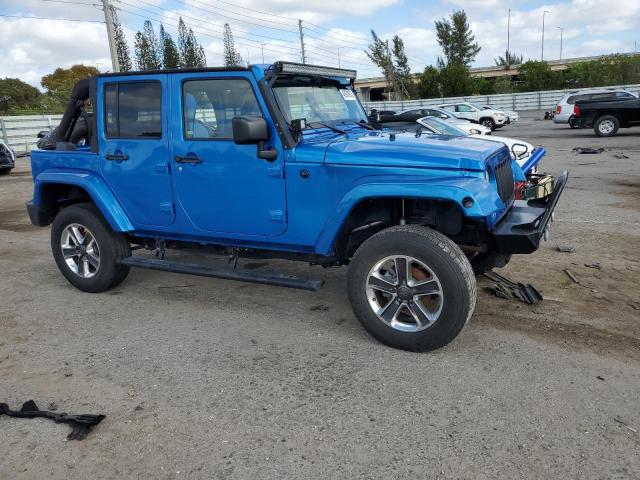 1C4HJWEG1FL718530 - 2015 JEEP WRANGLER U SAHARA BLUE photo 4