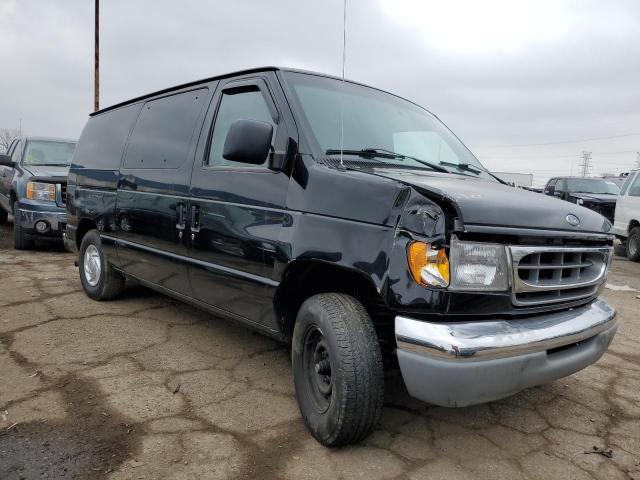 1FTRE1426XHB27924 - 1999 FORD ECONOLINE E150 VAN BLACK photo 4