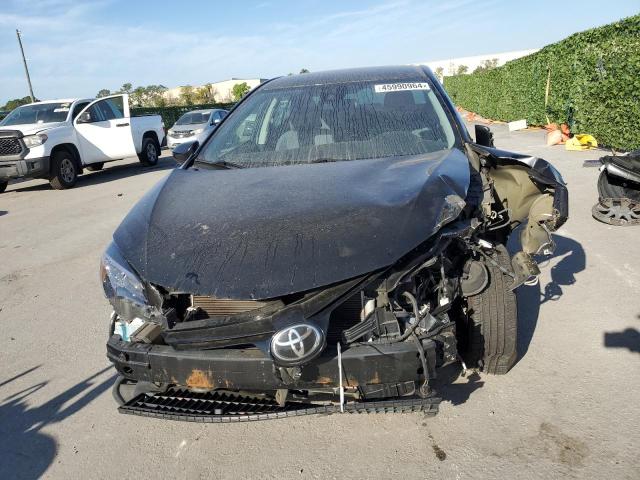 5YFBURHEXHP737466 - 2017 TOYOTA COROLLA L BLACK photo 5