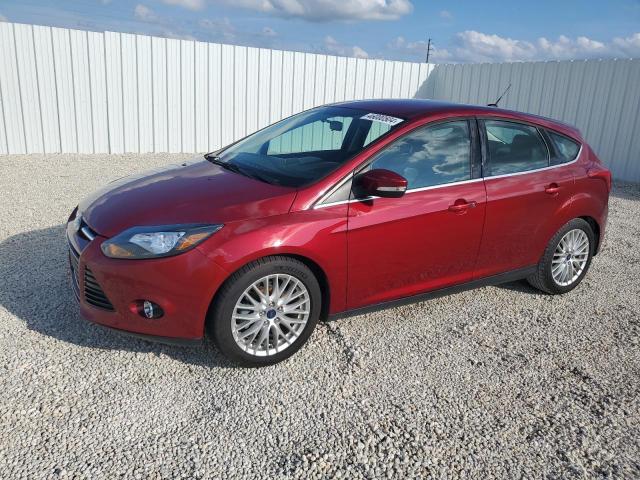 1FADP3N29EL173102 - 2014 FORD FOCUS TITANIUM RED photo 1