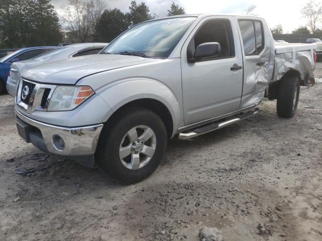 1N6AD0ER5AC401461 - 2010 NISSAN FRONTIER CREW CAB SE SILVER photo 1