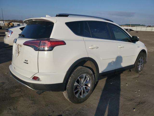 JTMRJREV6GD007700 - 2016 TOYOTA RAV4 HV XLE WHITE photo 3