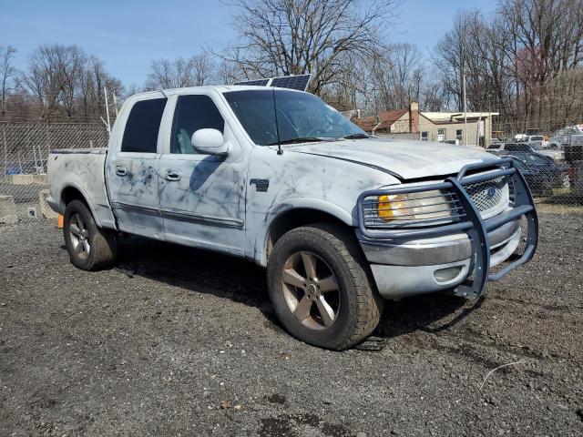 1FTRW08W01KE20989 - 2001 FORD F150 SUPERCREW GRAY photo 4