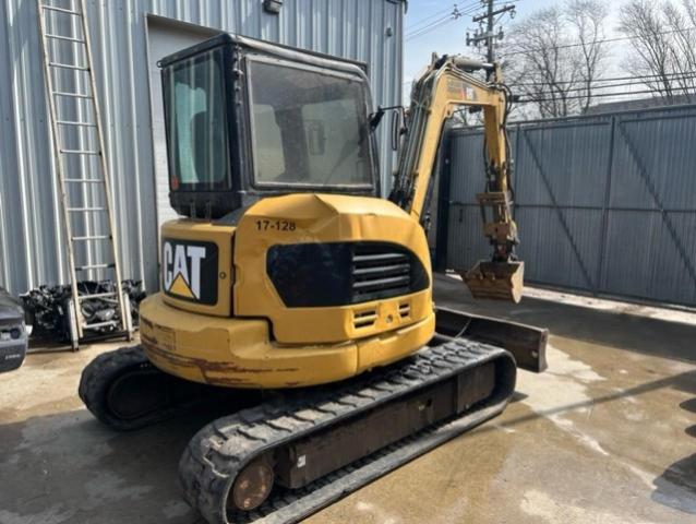 CAT3055DKFLZ00L97 - 2012 CATERPILLAR 305.5D YELLOW photo 1