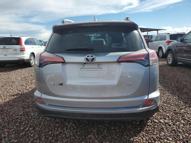 2T3ZFREV2JW459722 - 2018 TOYOTA RAV4 LE SILVER photo 6