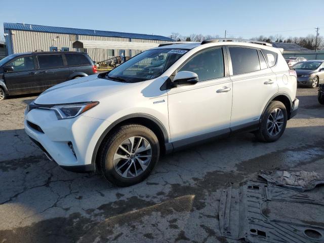 JTMRJREV7HD067504 - 2017 TOYOTA RAV4 HV LE WHITE photo 1