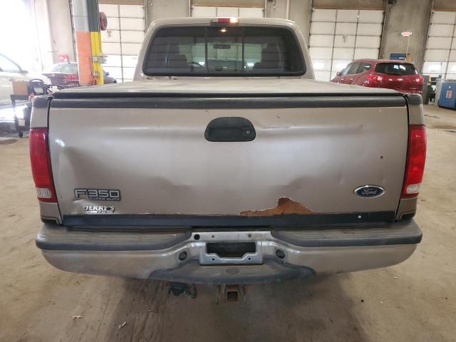 1FTSW31PX4EA11570 - 2004 FORD F350 SRW SUPER DUTY TAN photo 6