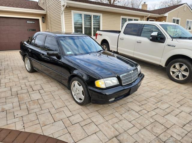 WDBHA33GXWF735759 - 1998 MERCEDES-BENZ C 43 BLACK photo 1