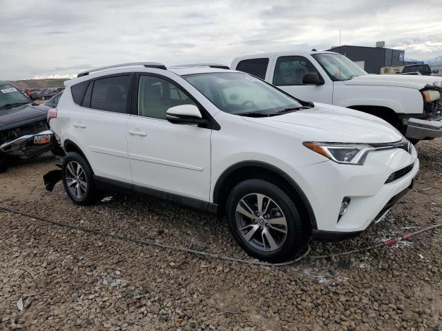 JTMRFREV3GJ065637 - 2016 TOYOTA RAV4 XLE WHITE photo 4