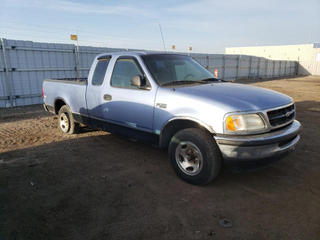 1FTDX1724VKC04256 - 1997 FORD F150 BLUE photo 4