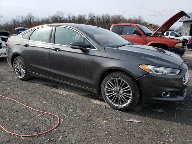 3FA6P0T92GR310067 - 2016 FORD FUSION SE CHARCOAL photo 4