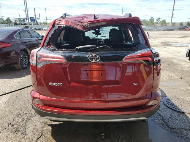 JTMNFREV2JD108689 - 2018 TOYOTA RAV4 SE RED photo 6