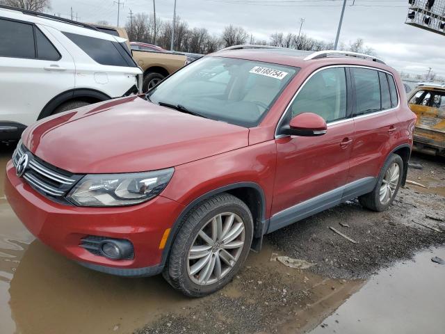 WVGAV7AX9GW068181 - 2016 VOLKSWAGEN TIGUAN S RED photo 1