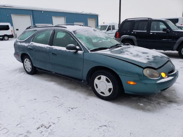 1FALP57U2VG219206 - 1997 FORD TAURUS GL TURQUOISE photo 4