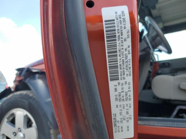 1J4FA54139L745077 - 2009 JEEP WRANGLER SAHARA ORANGE photo 12