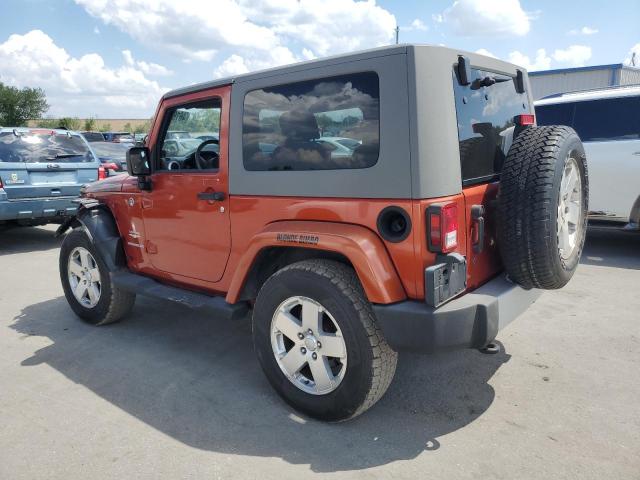 1J4FA54139L745077 - 2009 JEEP WRANGLER SAHARA ORANGE photo 2