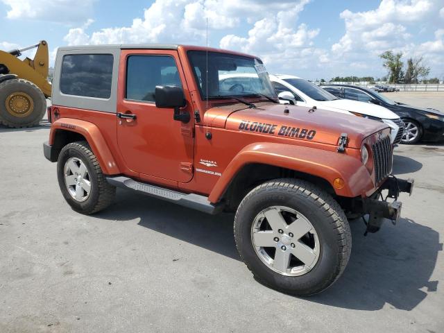 1J4FA54139L745077 - 2009 JEEP WRANGLER SAHARA ORANGE photo 4