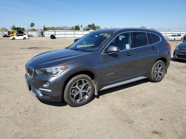 WBXHT3Z34J4A66415 - 2018 BMW X1 XDRIVE28I GRAY photo 1