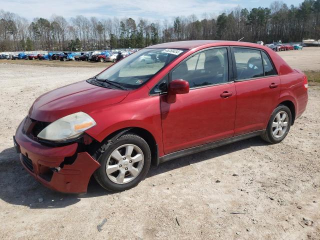 3N1BC11E09L405309 - 2009 NISSAN VERSA S RED photo 1