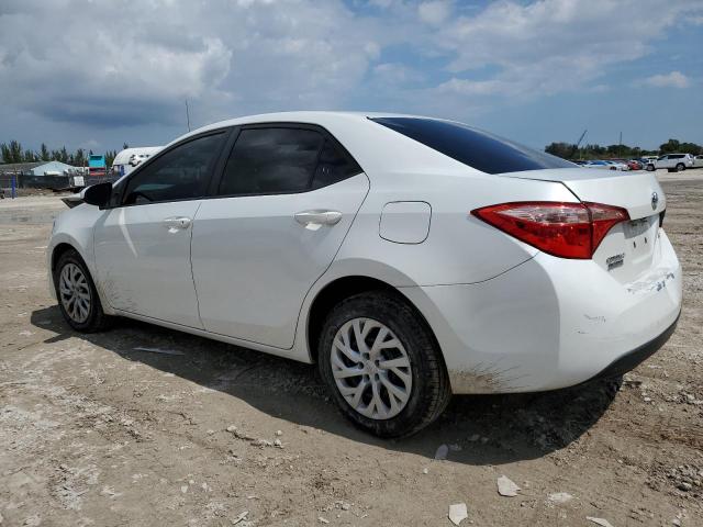 5YFBURHE9KP890346 - 2019 TOYOTA COROLLA L WHITE photo 2