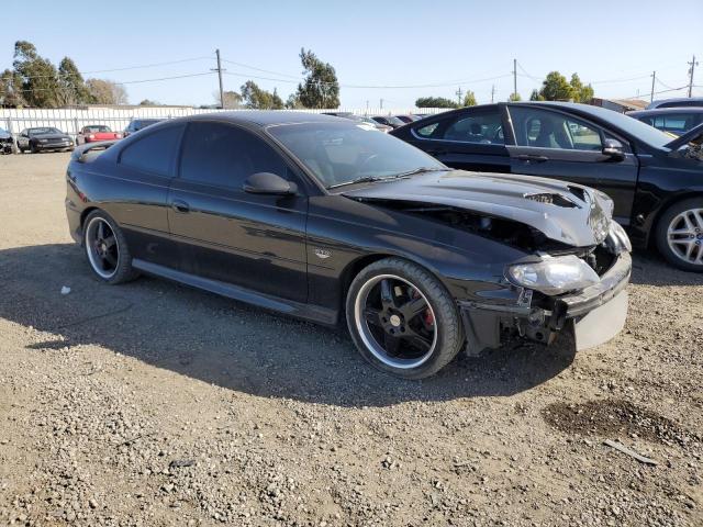 6G2VX12UX6L527176 - 2006 PONTIAC GTO BLACK photo 4