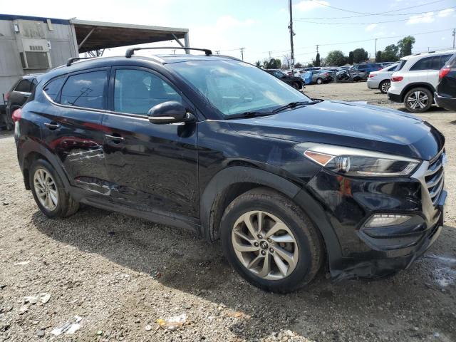 KM8J3CA23GU040116 - 2016 HYUNDAI TUCSON LIMITED BLACK photo 4