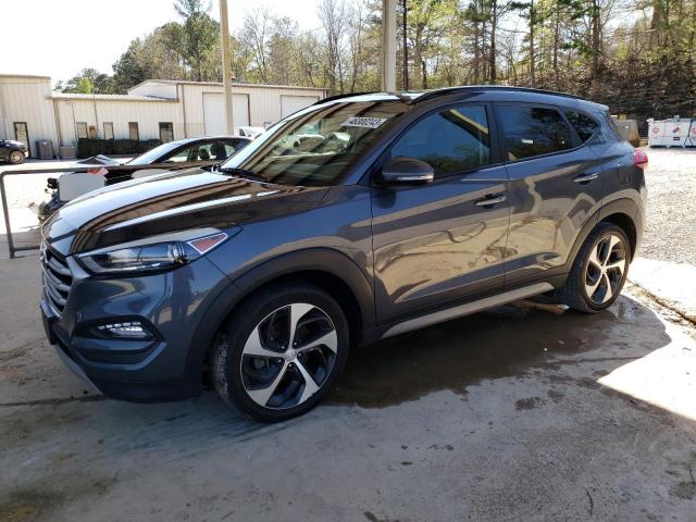 KM8J33A2XJU621202 - 2018 HYUNDAI TUCSON VALUE GRAY photo 1